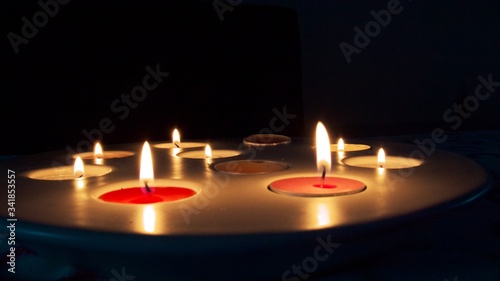 Multiple Tealights - Candles in the Dark / Night on a Table 