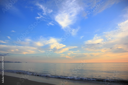 Sea or beach on twilight sky and on the sunset for background.
