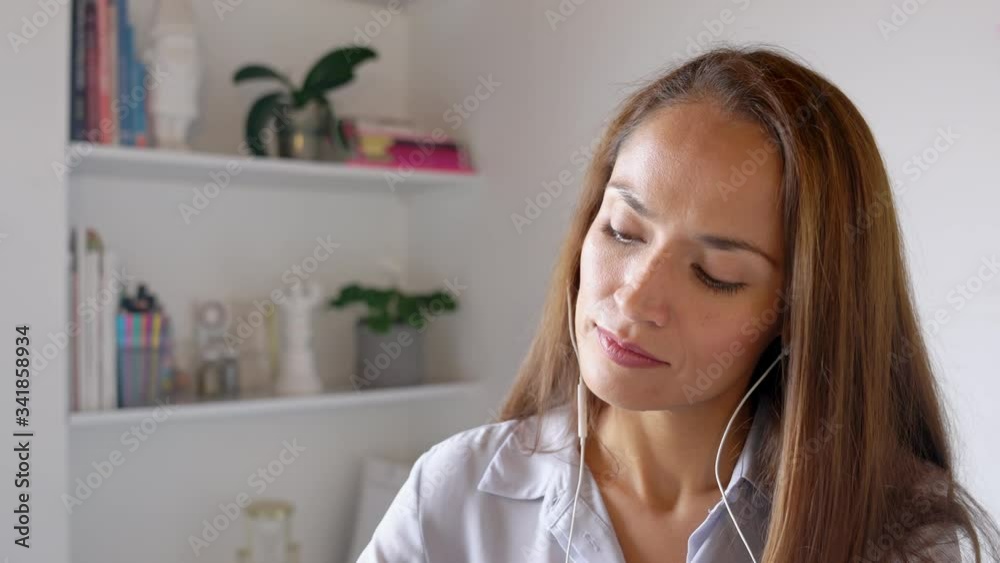 Young woman looking pensive positive and writing notes. Closeup 4k. Young woman looking pensive positive and writing notes. Closeup 4k.