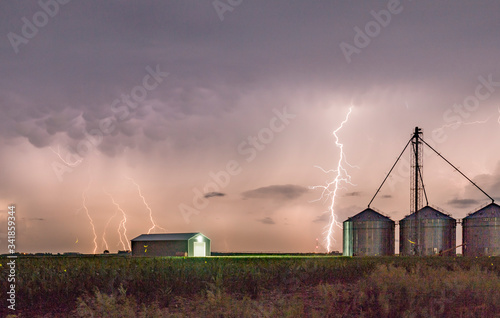 Dramatic Lightning Storm Over a Farm on the Great Plains During Summertime