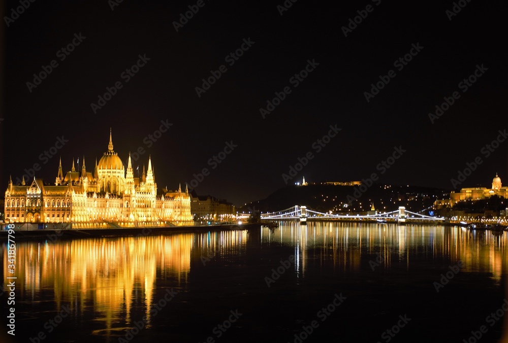 Parliament Palace and the bridge over the Danube in Budapest at night