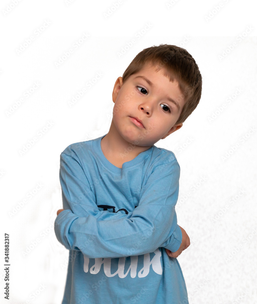 little boy pondered and crossed his arms on his stomach little boy pondered and crossed his arms on his stomach