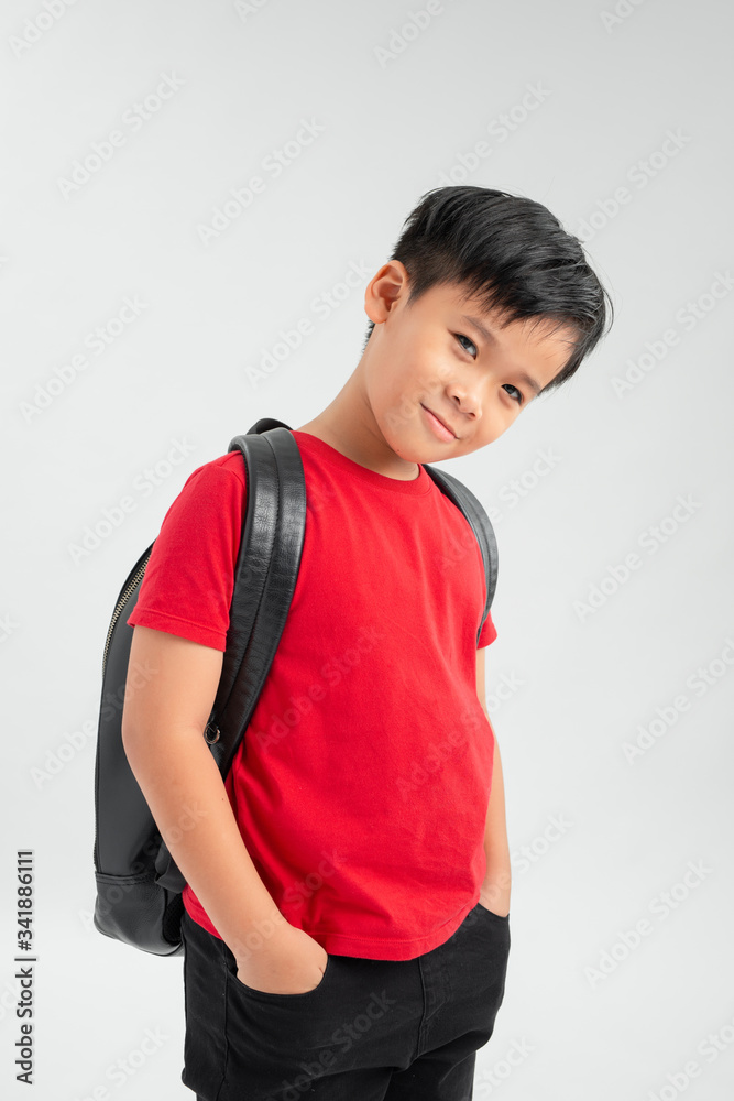 Back to school - Portrait of Asian school boy child smiling with school bag Back to school - Portrait of Asian school boy child smiling with school bag