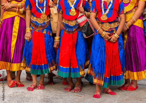 Female dancers with painted feet waiting to perform at Hindu Kapaleeshwarar Temple, Chennai, Tamil Nadu, South India