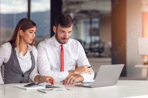 Young Business people working together on computer