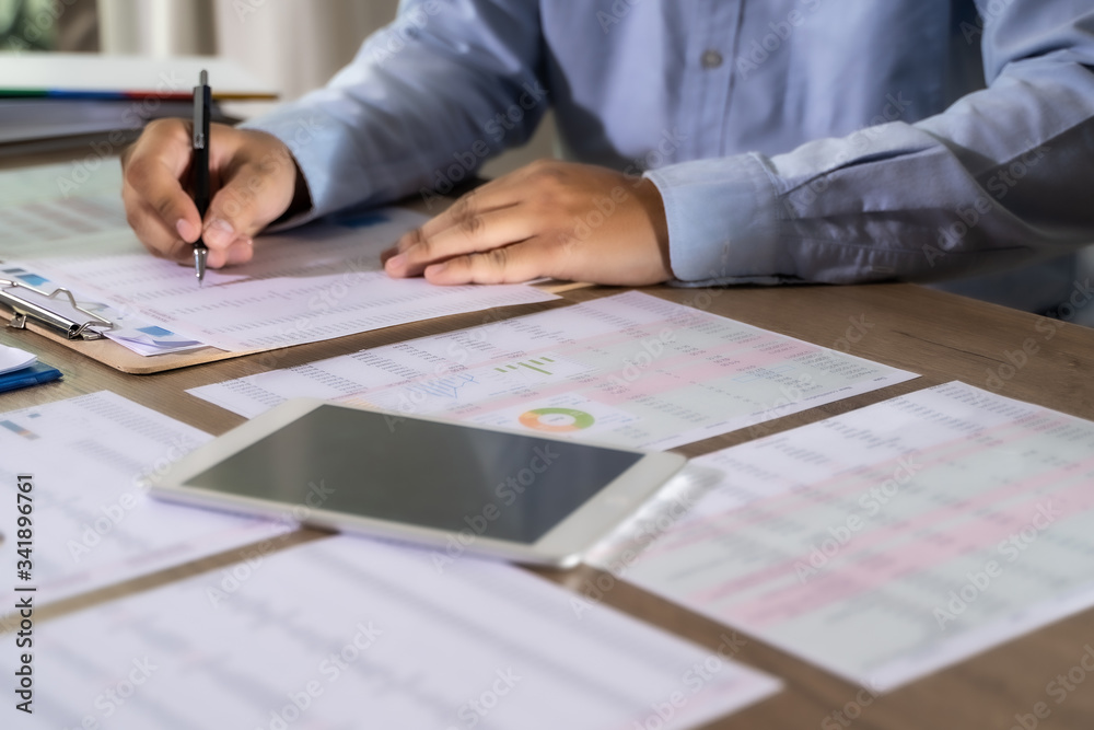 businessman working using a calculator finance accounting concept achievement to balance man assistant accounting. businessman working using a calculator finance accounting concept achievement to balance man assistant accounting.