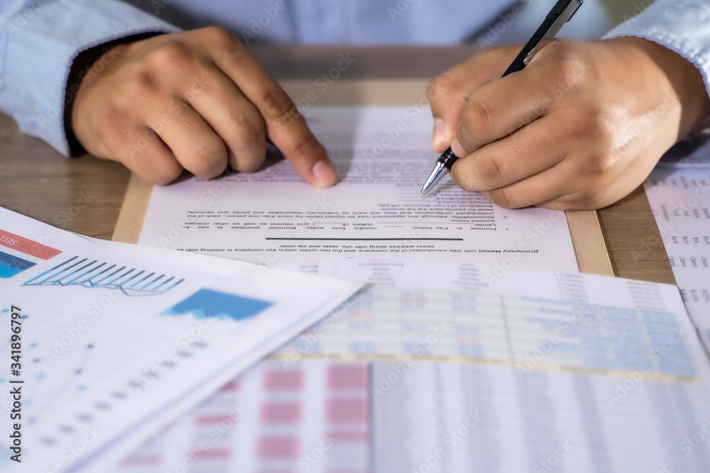 businessman working using a calculator finance accounting concept achievement to balance man assistant accounting. businessman working using a calculator finance accounting concept achievement to balance man assistant accounting.