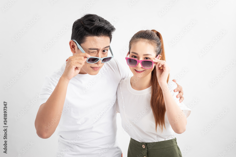 Cheerful happy family in glasses embracing and having vacation