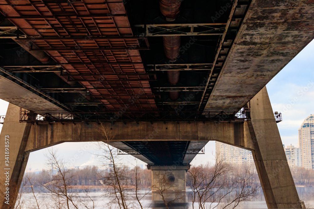 Under North bridge (Moscow bridge) across the Dnieper river in Kiev, Ukraine Under North bridge (Moscow bridge) across the Dnieper river in Kiev, Ukraine