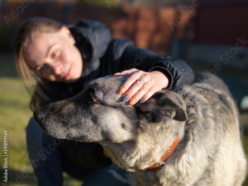 Woman with unfriendly dog
