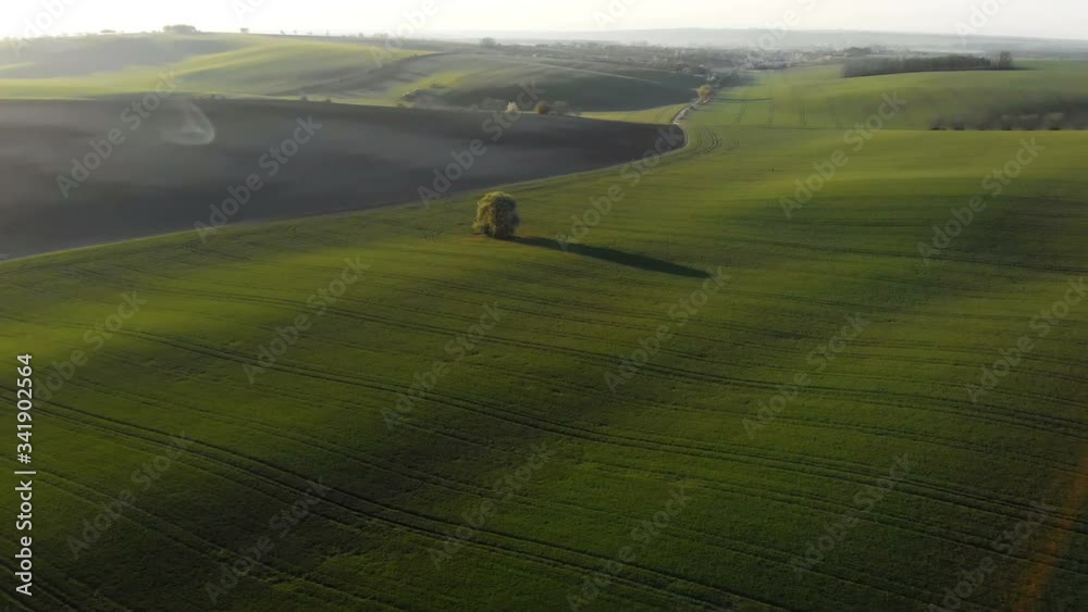 Fantastic view of the beautiful green hilly fields of Moravia, Czech Republic. Top view from drone. Fantastic view of the beautiful green hilly fields of Moravia, Czech Republic. Top view from drone.