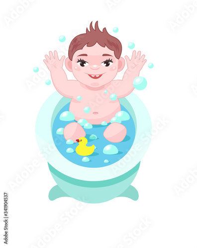 Little cute baby bathes in bath with water, has fun.