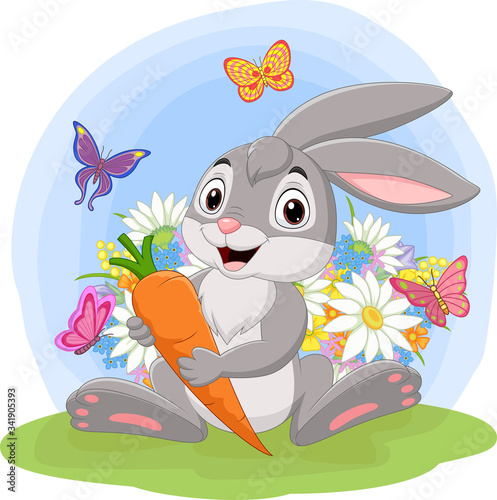 Cartoon rabbit holding a carrot in the grass