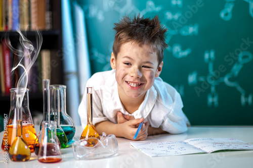 Boy in chemistry lesson