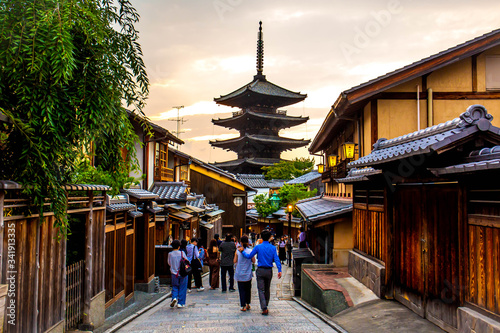 KYOTO, JAPAN - JUNE 22, 2019 :: Ninenzaka and Sannenzaka, a popular historical alleys in Kyoto. photo