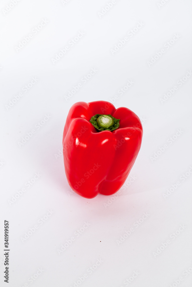 perfect red bell pepper on a white backdrop. perfect red bell pepper on a white backdrop.
