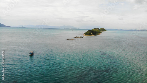 Aerial of Diep Son island, Vanh Ninh, Van Phong Bay, Khanh Hoa. the Island is famous for the white sand road locate under the sea water level connecting two islands with natural scenery wild photo