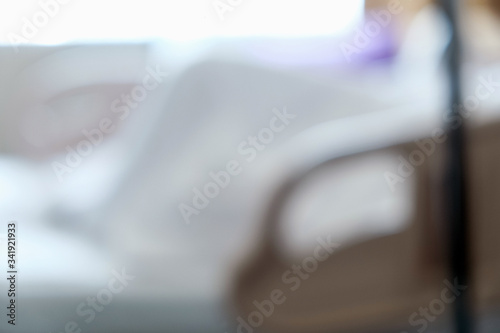 Abstract blur of Elderly patients in hospital bed background