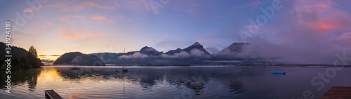 Peaceful autumn Alps mountain lake. Sunrise Wolfgangsee lake view, St. Wolfgang im Salzkammergut, Upper Austria. photo