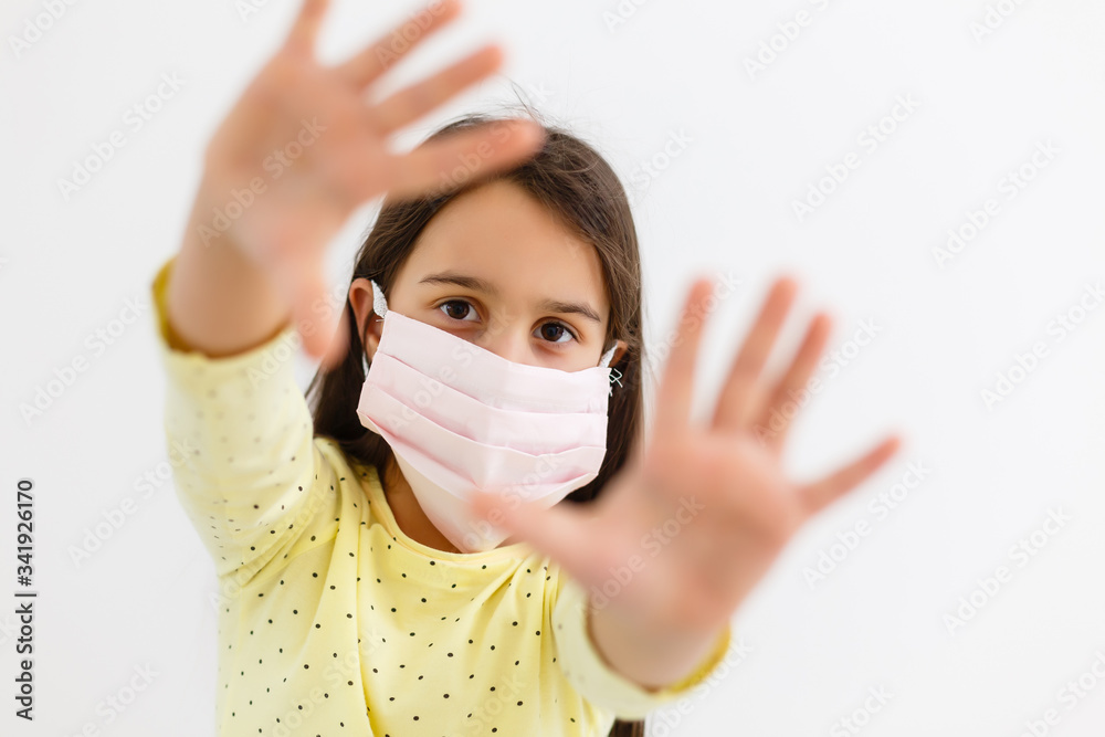 little girl wear mask on white background, A girl wearing protection medical mask covid-19 or coronavirus from Infected person, corona protected Help protect For world and people stop virus warning