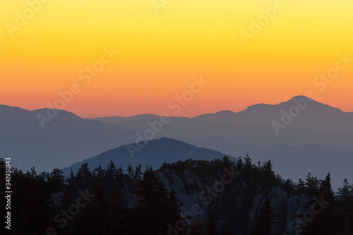 Sunset on the mountain with the layers of the hills, Croatia © Goran
