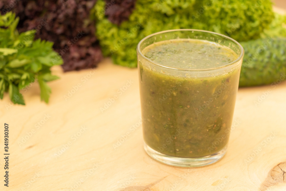 Green healthy smoothie. Salad in a glass. Watch your diet. Vegetarian preferences. Yummy.