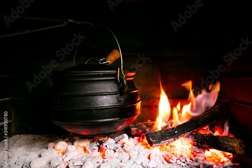Black Potjie Food South African pot with fire
