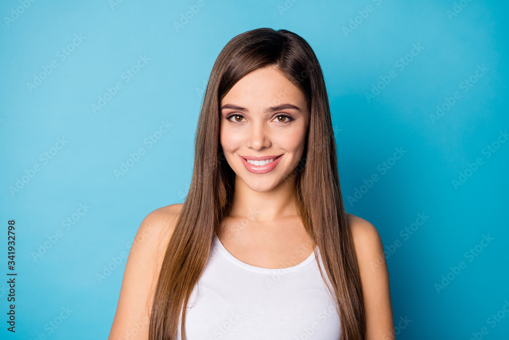 Portrait of attractive nice girl enjoy spring free time weekend look in camera listen her friends wear modern clothes isolated over blue color background