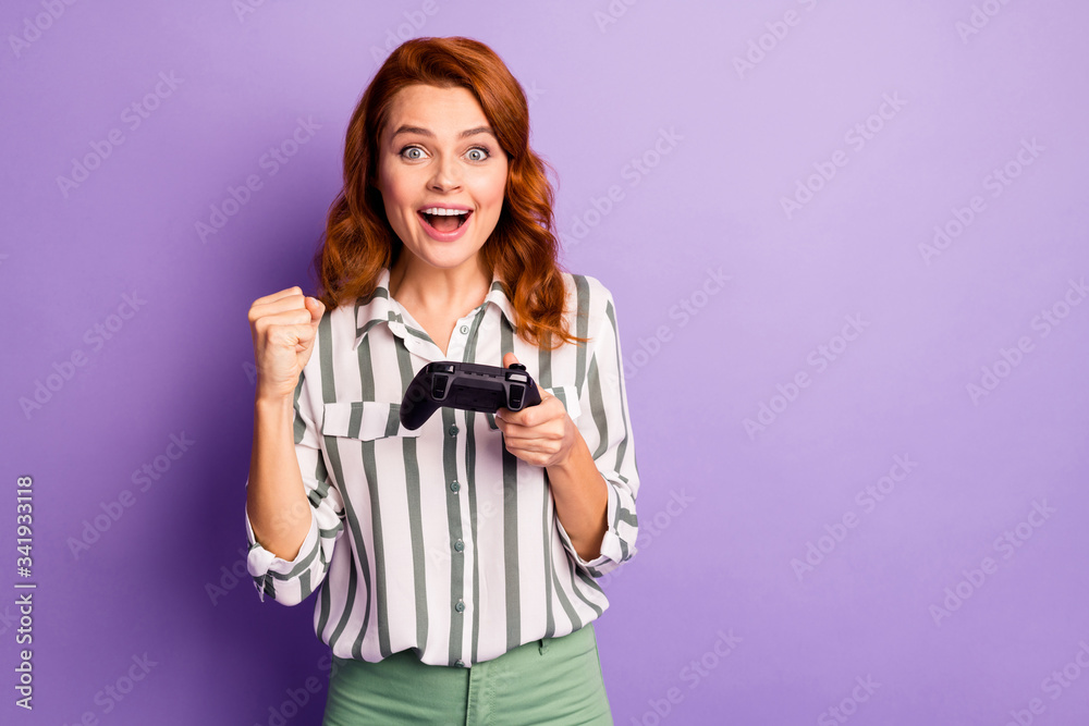 Omg i am best. Astonished funny woman feel competitive play video game hold joy stick win impressed scream wow omg wear formalwear style clothing isolated over purple color background Omg i am best. Astonished funny woman feel competitive play video game hold joy stick win impressed scream wow omg wear formalwear style clothing isolated over purple color background