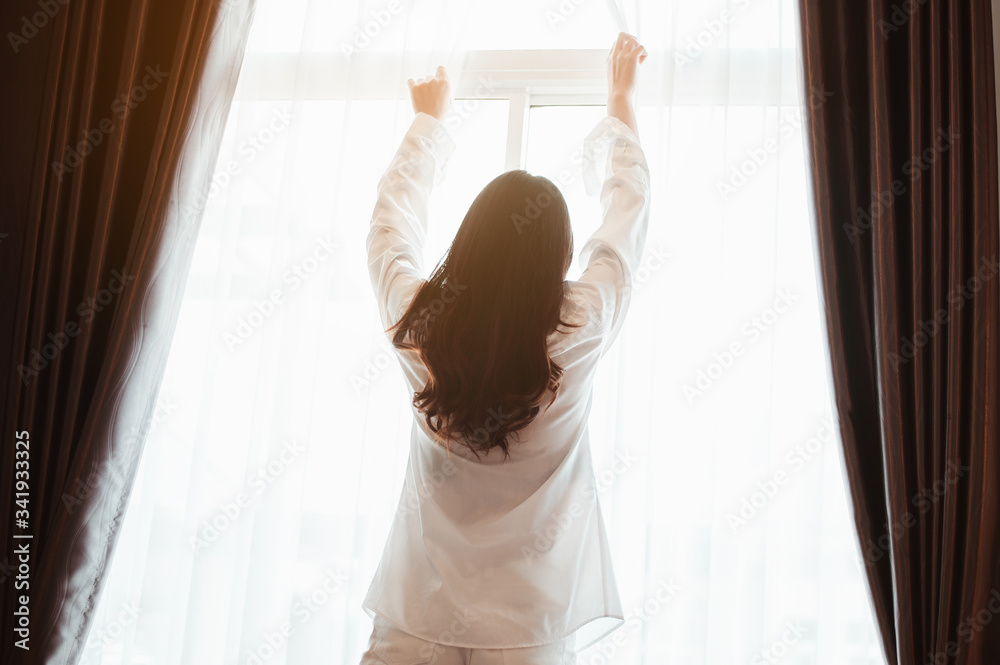 Young woman asia wake up refreshed in the morning and relax in the bedroom on holiday. Asian, asia, relax, alone, technology, lifestyle concept. Young woman asia wake up refreshed in the morning and relax in the bedroom on holiday. Asian, asia, relax, alone, technology, lifestyle concept.