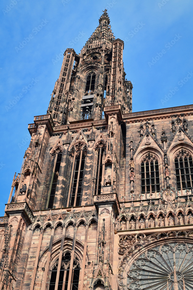 Tower of famous Strasbourg Cathedral in France in romanesque and gothic architecture style