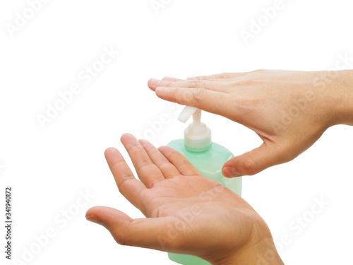 pumping soap or hand sanitizer from container for hand washing or sanitizing
