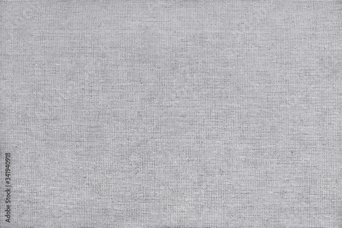 Light grey cotton fabric texture background, seamless pattern of natural textile.
