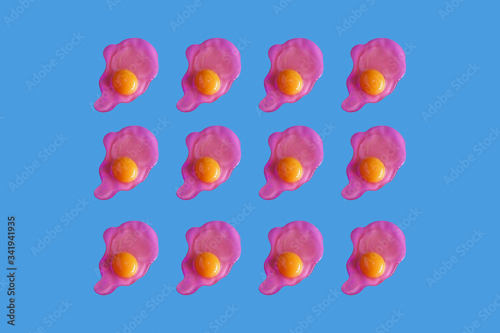 Pop art pink eggs pattern on blue background. Creative trendy minimal food layout. Funny abstract backdrop for design or print Pop art pink eggs pattern on blue background. Creative trendy minimal food layout. Funny abstract backdrop for design or print