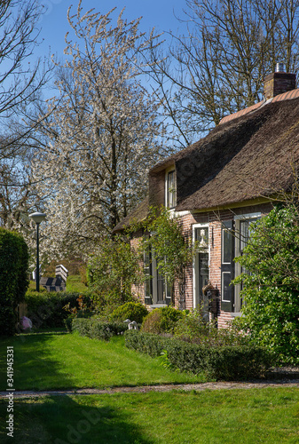 Giethoorn Overijssel Netherlands. During Corona lock-down. Empty streets, paths, bridges and canals. Old farmhouse