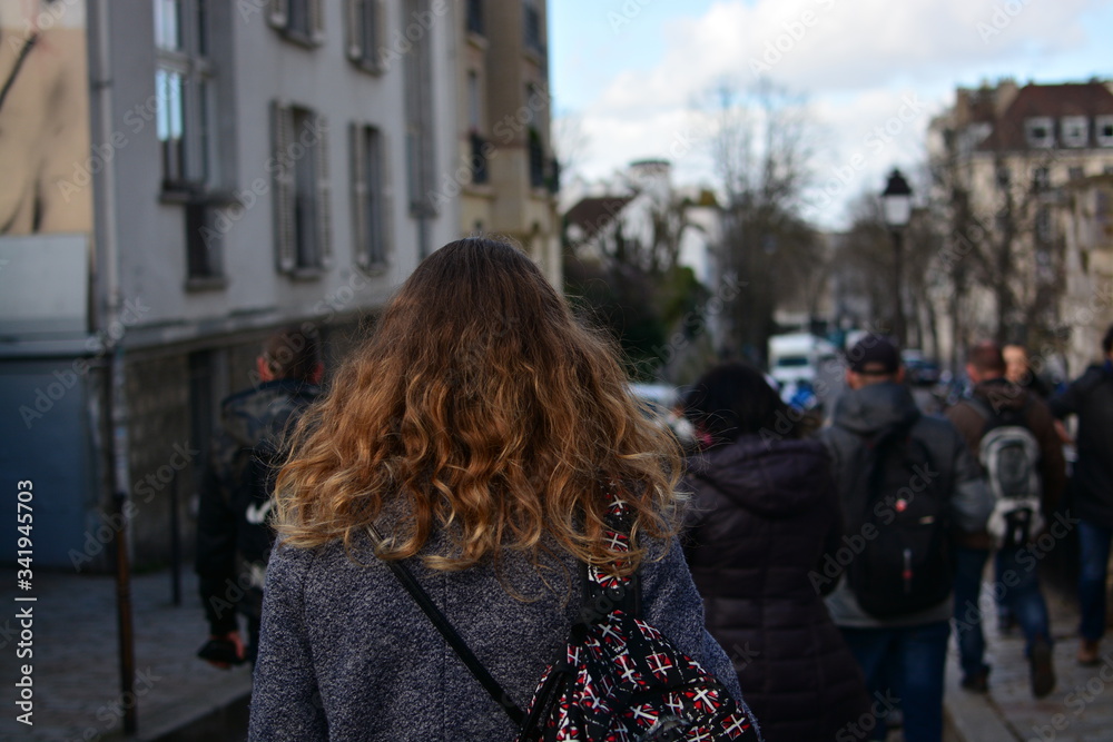 young woman walking on the street