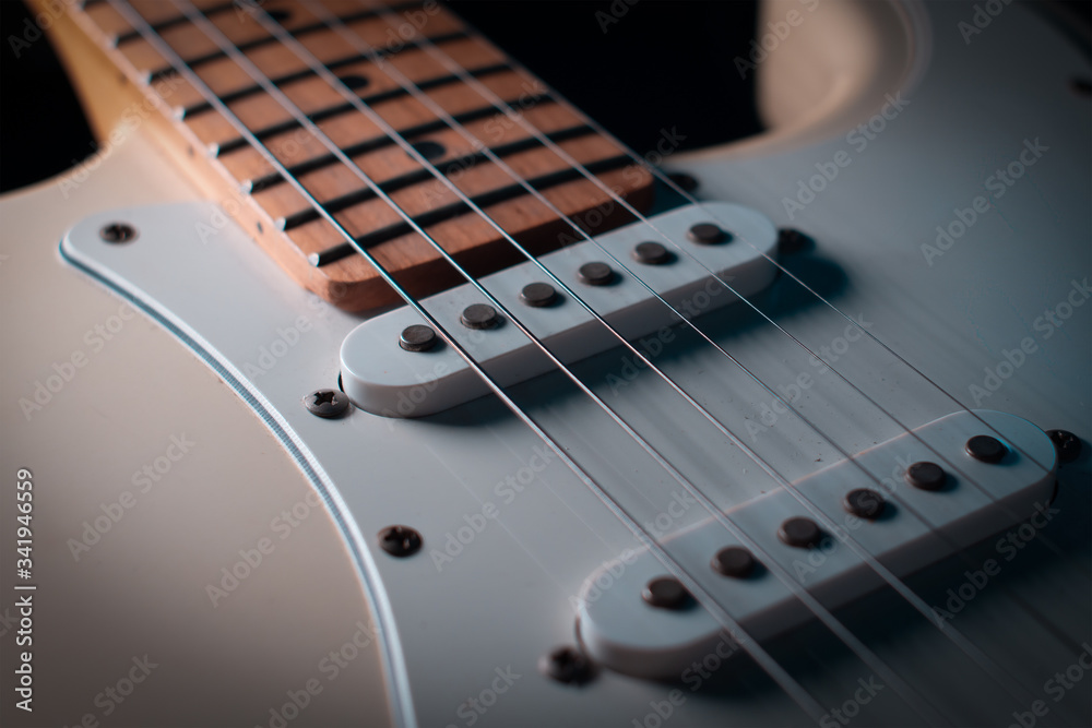 Fototapeta premium Electric guitar stratocaster closeup detail, macro abstract