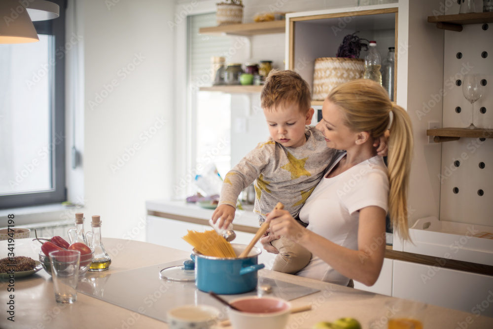 He loves spending time in the kitchen.