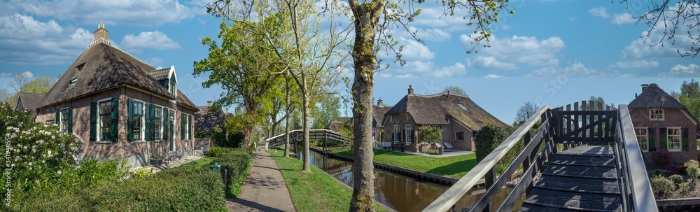 Giethoorn Overijssel Netherlands. During Corona lock-down. Empty streets, paths, bridges and canals. Old farmhouse