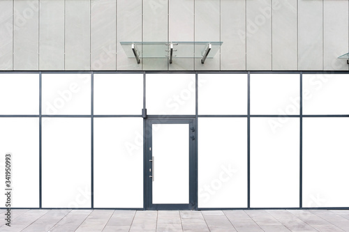 Front view of a store exterior with blank white windows. Mock up for advertisement