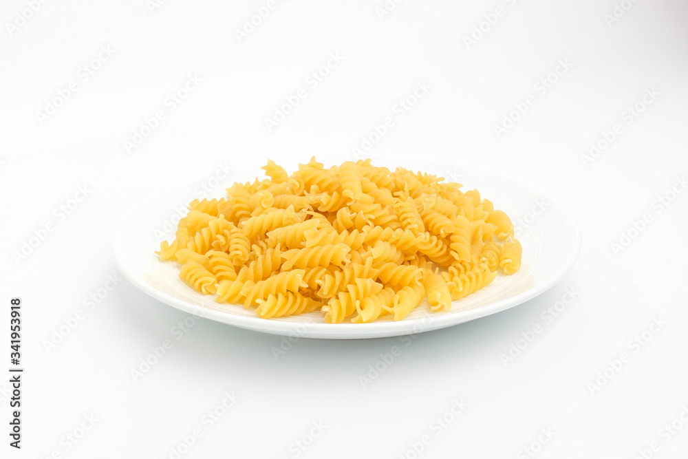 Spiral fusilli on a white background Spiral fusilli on a white background