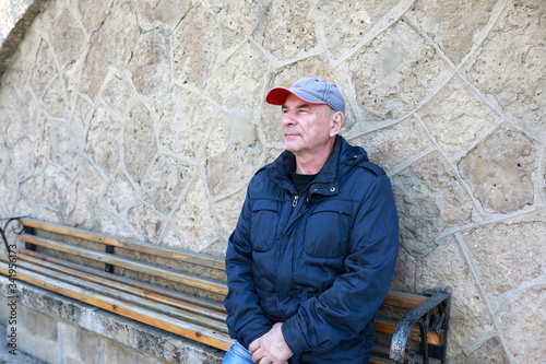 Senior man on bench
