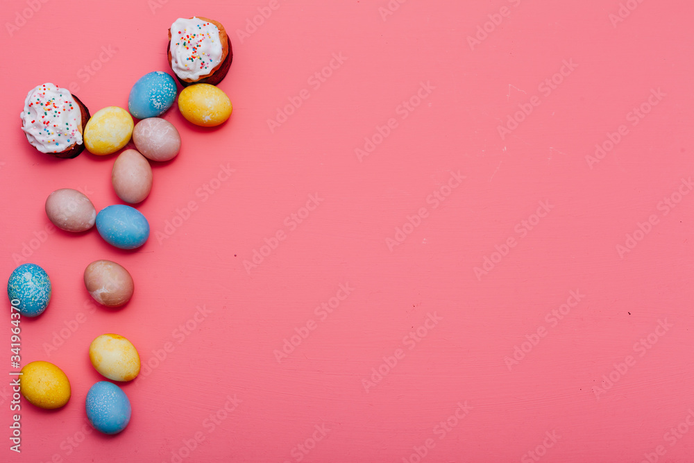 Obraz premium multi-colored eggs for the Easter holiday on a pink background
