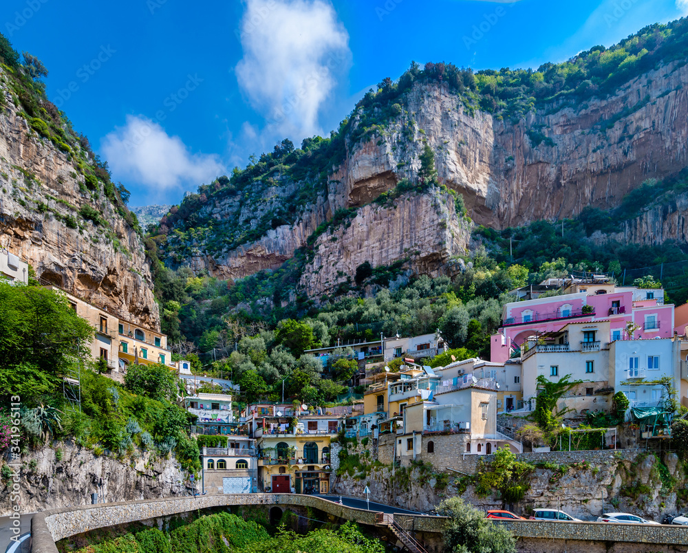 Turn of narrow road in  Positano town  at  Amalfi Coast, Italy.