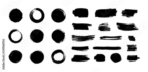Vector black paint brush strokes set isolated on white background, japanese enso circles, different ink blots, dry painting.