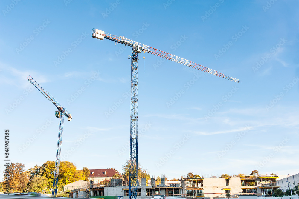 High cranes on the construction site