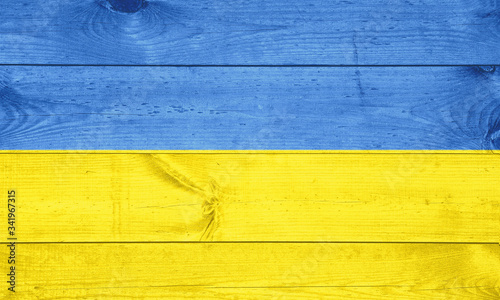 Ukraine flag on wooden background