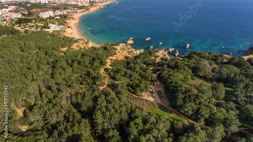 Aerial view of the beautiful bay of the Portuguese coast of the city of Portimao. Beaches Vao, Tres Irmaos.