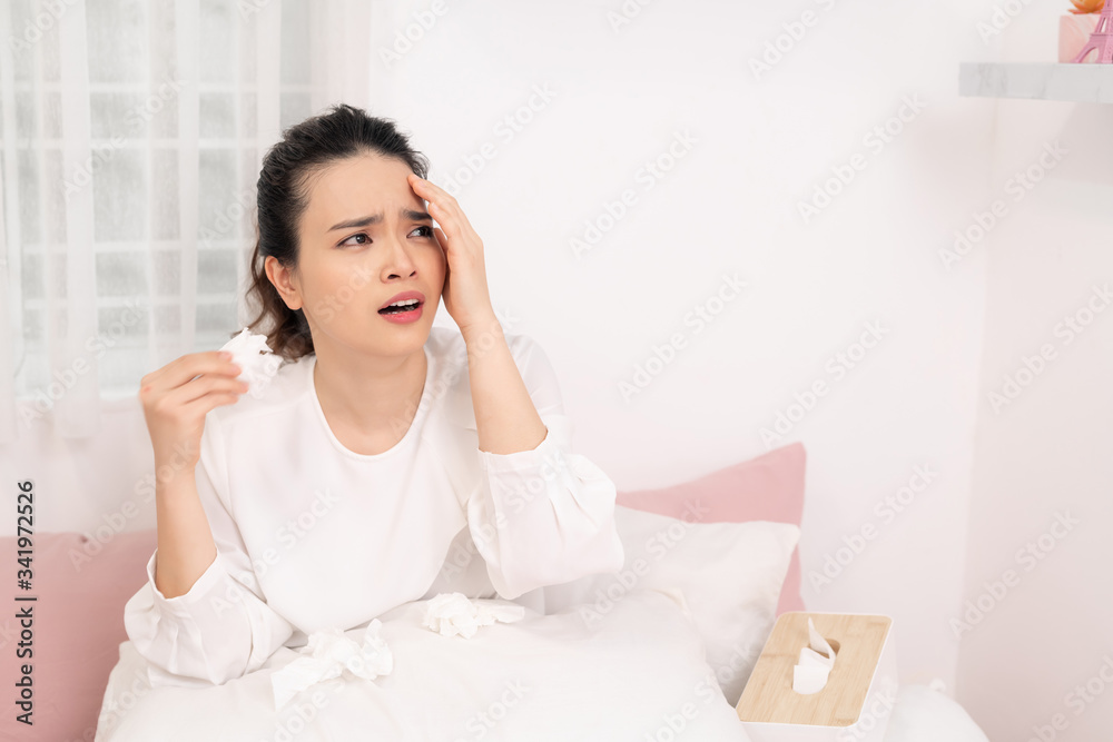 Sick woman with seasonal infections, flu, allergy lying in bed. Sick woman with seasonal infections, flu, allergy lying in bed.