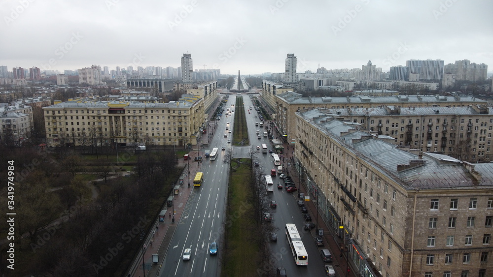 Saint Petersburg cloudy architecture city road street parking panorama Moskovsky prospect passing cars tall houses